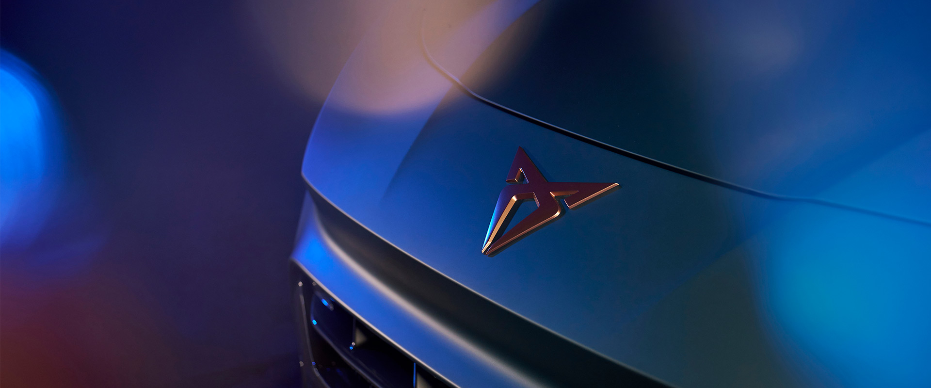 Close-up emblem on the front of a CUPRA