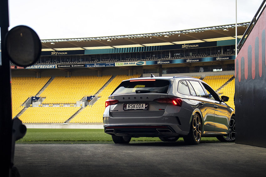 A Skoda Octavia RS wagon driving into a sports satdium