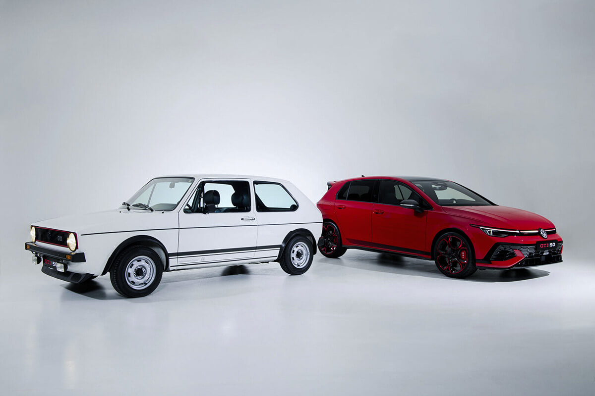 A 50th anniversary edition Golf GTI next to a classic Golf GTI in white