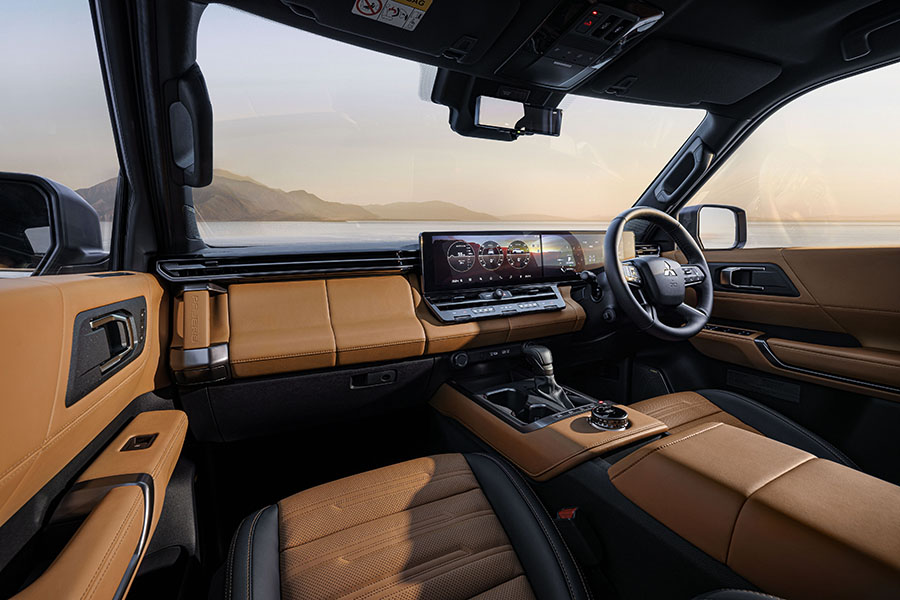 A brown leather inteiror of a Pajero SUV